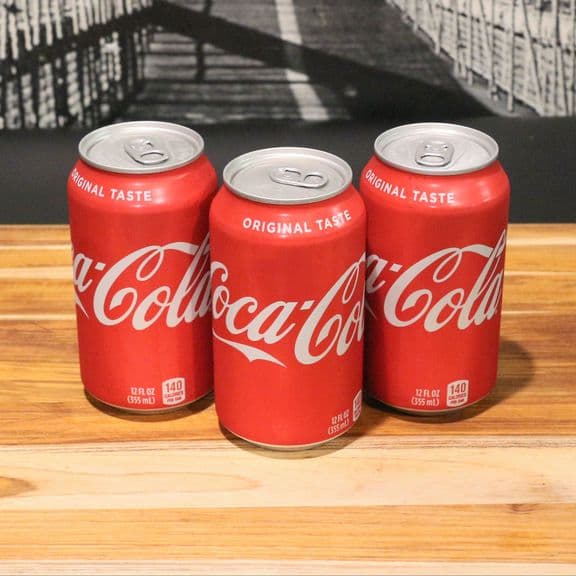 Coke - Classic Coca-Cola served ice cold in a can.