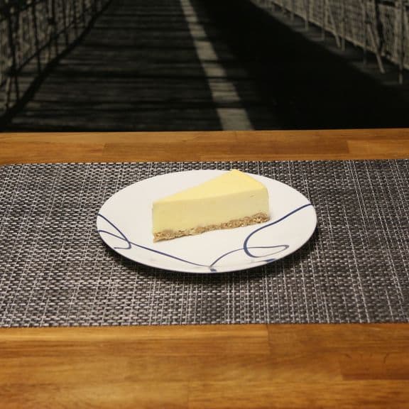 Cheese Cake - Creamy New York style cheesecake with a buttery graham cracker crust.