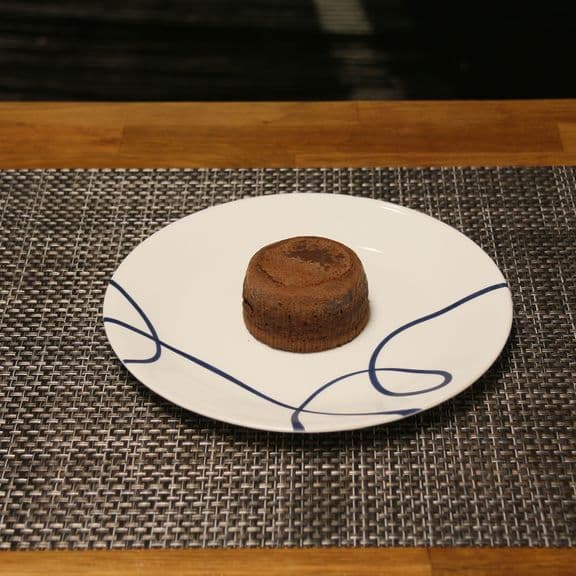 Chocolate Lave Cake - Warm chocolate cake with a molten chocolate center, served fresh from the oven.