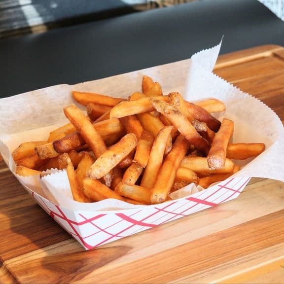 Just Fries - Golden-brown french fries, perfectly seasoned and crispy on the outside, fluffy on the inside. Our signature regular cut fries.