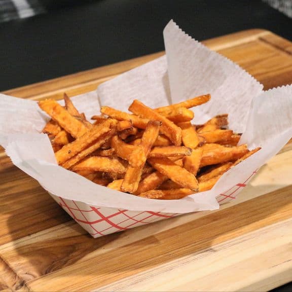 Small Sweet Potato Fries - A smaller portion of our sweet potato fries, crispy on the outside and tender inside.