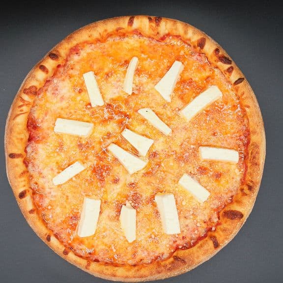 Four Cheese Pizza - Pizza sauce, mozzarella cheese, Cheddar cheese, Fresh mozzarella cheese and Parmesan cheese