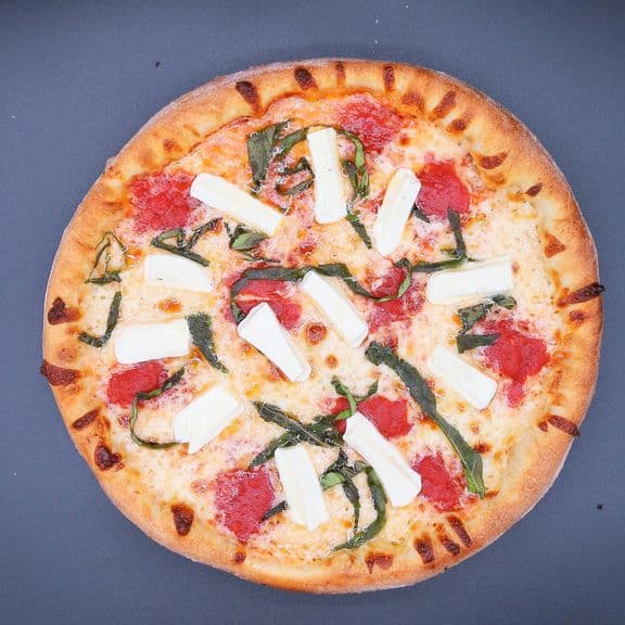 Extra Napkin Margherita Pizza - House garlic sauce, Mozzarella, touch of pizza sauce, fresh basil